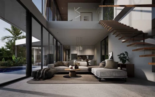 Просторная гостиная с серым угловым диваном и стеклянными стенами