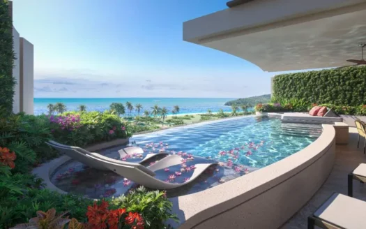 Уличная терраса у бассейна с изогнутыми лежаками и морем