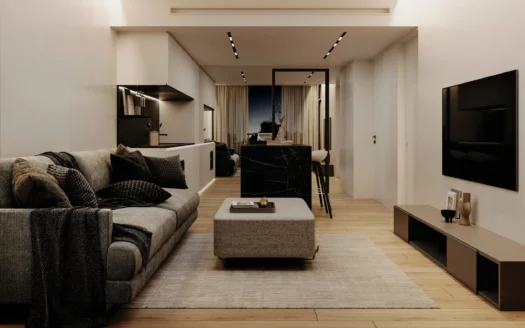 Гостиная с серым диваном, черным мраморным островом и стеной с телевизором