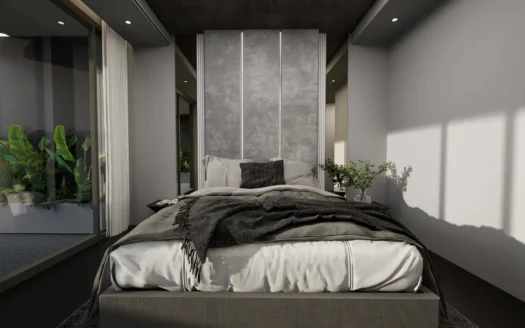 Современная спальня с серым изголовьем кровати и зеленью