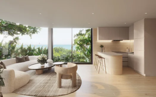 Яркая гостиная с изогнутым бежевым диваном и видом на океан