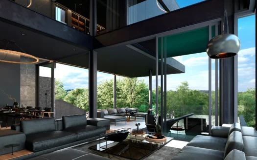 Гостиная с темной кожаной мебелью и стеклянными стенами, вид на зелень