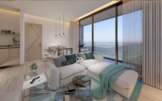 Яркая гостиная с белым диваном и видом на океан