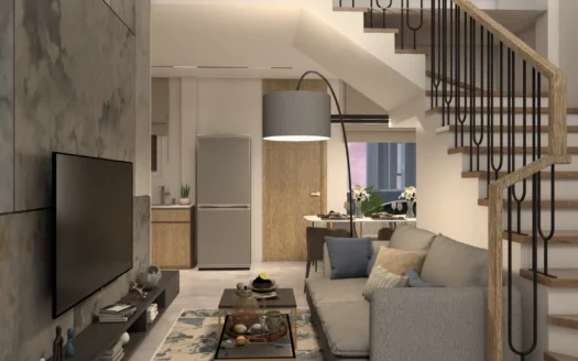 Гостиная с серым диваном, лестницей и телевизором