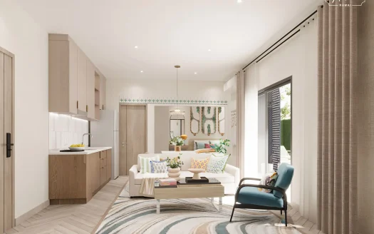 Гостиная с открытой планировкой, бежевые кухонные шкафы и синее кресло