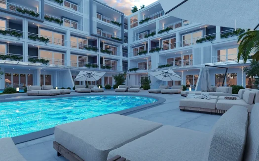 Уличный бассейн во внутреннем дворе современного белого комплекса