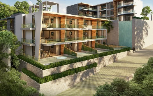 Террасное здание с балконами со стеклянными ограждениями и зеленью