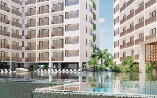 Вид снаружи на белые жилые башни с балконами и центральным бассейном