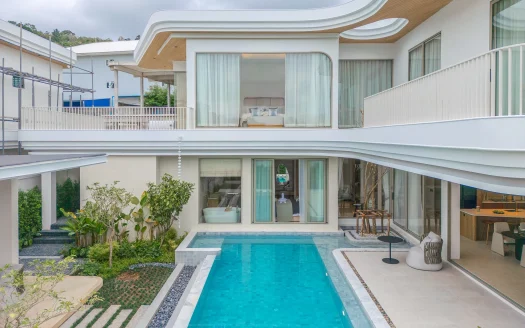 Экстерьер современного дома с бирюзовым бассейном