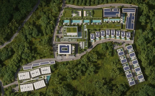 Воздушный вид на экологический курорт с солнечными крышами среди деревьев